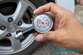 Checking Tire Pressure before drive