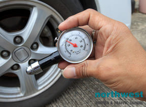 Checking Tire Pressure before drive