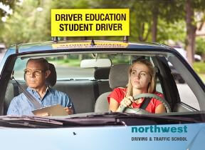 girl doing driving exam with examiner